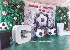 the letters g are decorated with soccer balls