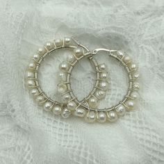 Amazing freshwater pearls woven hoop earrings, perfect mindfulness gift or bridesmaid thank you gift idea. This handmade real pearl earrings and gold or silver component, are authentic for you, the irregular natural pearl shape gives these earrings a more modern, boho flair. They hoops earrings will add some cool and elegant to your look. ♥ I T E M ~ D E T A I L S: Small * Lenght: 1.5 inch * Wide: 1.5 inch Medium * Lenght: 1.7 inch * Wide: 1.7 inch * Materials: Fresh water pearls, gold or silver Modern Pearl Jewelry, Kabbalah Bracelet, Real Pearl Earrings, Raw Crystal Necklace, Protection Bracelet, Crystal Choker, Pearl Hoop Earrings, Real Pearls, Hippie Jewelry