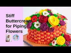 a cake with flowers on it sitting on top of a wooden table next to an advertisement for buttercream basket of flowers