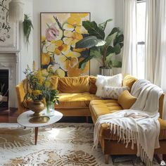 a living room with yellow couches and white rugs on the floor in front of a fireplace