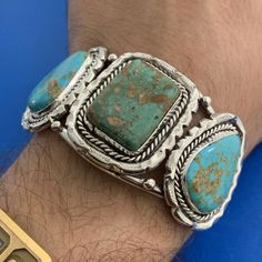 * Old Pawn Unsigned Native American Sterling Turquoise Wide Open Cuff Bracelet * Inner Cuff Measures: 5-1/2" * Gap Measures: 1-1/8" * Center Rectangle Turquoise Cabochon Measures Approximately 25.4 Mm X 20.0 Mm * Two Pear Turquoise Cabochons Measure Approximately 25.8 Mm X 18.25 Mm Each * Bracelet Weight: 58.0 Tgw * Unmarked * Professionally Assayed * Condition: As Pictured. (Zch225br) * S5402 Turquoise Bangle Cuff Bracelet For Formal Occasions, Turquoise Bangle Bracelet For Formal Occasions, Formal Turquoise Bangle Bracelet, Elegant Turquoise Cuff Bracelet, Luxury Handmade Turquoise Bracelets, Luxury Handmade Turquoise Bracelet, Open Cuff Bracelet, Native American Jewelry, Womens Jewelry Bracelets