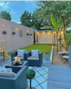 an outdoor patio with seating and lights