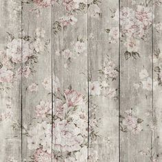 an old wooden wall with flowers painted on the wood planks in pink and white