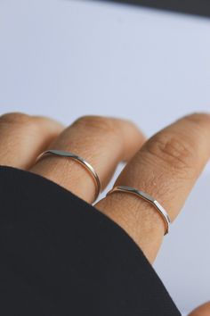 Effortlessly enhance your style with our Minimalist Sterling Silver Stacking Ring. Extremely comfortable and lightweight. This stunning piece will give you a unique, hand crafted and fresh new look. Whether its work or social, this ring will certainly compliment the occasion! A minimalist design perfect as a thoughtful gift or for treating yourself! -Wear independently or stacked with other rings! -Handmade and designed from scratch using 925 Sterling Silver. -14 Gauge. 1.6mm band diameter. -Nic Rings Minimalist, Minimalist Silver Ring, Halloween Couple, Stackable Rings Silver, Bohemian Jewellery, Sterling Silver Stacking Rings, Rings Handmade, Unique Jewelry Gifts, Zierlicher Ring