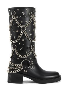 **FINAL SALE - NO EXCHANGES OR RETURNS** The Fillmore-Black Flat Boot is an edgy yet versatile addition to any wardrobe. These black biker boots feature a subtle block heel for comfort and style, while the chain draping and silver stud accents add a touch of rocker-chic to the silhouette. Shaft Height: 12.5" Opening Circumference: 14" Heel Height: 2" Biker Chic Fashion, Rocker Boots, Black Biker Boots, Boots 2024, Black Flat Boots, Platform Combat Boots, 2024 Wishlist, Luxury Designer Shoes, Ethiopian Opal Ring