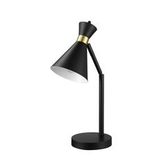 a black and white desk lamp with a gold trim on the top, sitting on a black base