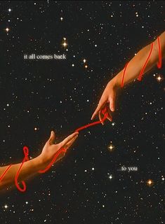 two hands reaching out towards each other with red string attached to them and stars in the background