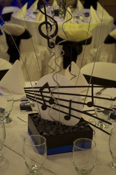 a musical note centerpiece on top of a table