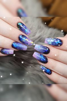 Let your nails dance to the rhythm of the night ✨ Jaw-dropping starry wonders, these ballerina-shaped acrylic nails steal the spotlight. Adorned with dazzling shimmering specks, every move creates a celestial sparkle. The elegant touch of purple tips adds a regal charm to this enchanting nail art masterpiece. // Photo Credit: Instagram @glamliciousnails Starry Night Nails Acrylic, Galaxy French Tip Nails, Celestial Nail Art Starry Nights, Nail Art Designs Purple, Acotar Nails, Purple Galaxy Nails, Cute Spring Nail Ideas, Blue Purple Nails, Night Sky Nails