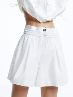 MO&Co. Women's Elasticated Double Waist Shorts Get the ultimate comfort and style with our shorts. The lightweight material and double waist design provide a relaxed fit, while the side pockets add convenience. Pair with our matching jacket for a casual yet sporty look. Features : - Loose fit, pleated design- Double elasticized drawstring waistband- Double-side pocket, UPF 40+ sun protection Code: MBD1SOTT04The back length of size S is 37.4cmMATERIALS & CARE Material: 100% ElastomultiesterPlease Sporty Dress, Mesh Bag, Sporty Look, Drawstring Waistband, Side Pocket, Dress Collection, Sun Protection, White Shorts, White And Black