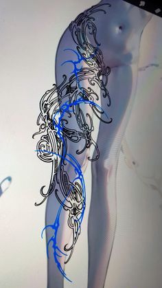 an artistic image of a woman's body with blue lines on the bottom and sides