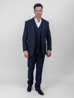 "WB Yeats Blue Slim Fit Tweed Jacket | Blue Slim Fit Tweed Blazer | Blue Sports Coat with Leather Elbow Patches | Gifts for him  This plain Donegal tweed patterned fabric has been designed to reignite your jacket collection. This tweed blazer has a blue tonal composition making it perfect for both day and evening events. The traditional herringbone blue tweed contains flecks of color, for an immediate feel of the Irish landscape. Cut with quirky design details, it has been designed with a nod to Irish historical events. This fabric champions versatility offering an all year round appeal. Named after one of Irelands greatest poets W B Yeats, one of Irelands greatest poets, who famously said, \"There are no strangers here just friends you haven't yet met.\" Sustainably made in the seaside to Blue Tweed Jacket For Business Casual, Blue Tweed Jacket With Welt Pockets, Blue Tweed Jacket With Notch Lapel, Blue Tweed Jacket With Pockets, Wb Yeats, Fitted White Shirt, Blue Tweed Jacket, Blue Sport Coat, W B Yeats