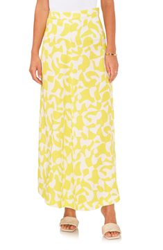 Every closet needs this A-line skirt crafted from a soft linen blend that makes a stylish transition from work to weekend. 35 1/2" length Hidden side-zip closure Lined 95% linen, 5% rayon Machine wash, line dry Imported A-line Maxi Skirt For Spring Daywear, Yellow Wide Leg Maxi Skirt For Spring, Yellow A-line Bottoms For Spring, Spring Workwear Rayon Skirt, Rayon Skirt For Workwear In Spring, Closet Needs, A Line Skirt, Vince Camuto, A Line Skirts