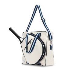 a white and blue handbag with a tennis racket in the front, on a white background