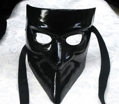 This masquerade mask for men belongs to our collection of historical masks: traditionally they were used in the past centuries in Venice. The name of this mask is Bauta and it was traditionally used by men. It is perfect for any masquerade party, Halloween costume, pro or event in Venice or elsewhere during Carnival. This mask can be gently bent to form to your face and ties in the back with two soft matching ribbons. Since the mask is handmade, your mask could be lightly different from the one Black Full Face Carnival Masks, Full Face Black Costume Mask, Black Full Face Masks For Costume, Black Full Face Masks For Costumes, Black Full Face Costume Mask, Black Full Face Masks For Carnival, Black Full Face Masquerade Mask For Costume, Full Face Black Masquerade Mask For Costume, Black Formal Eye Mask