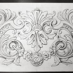 a drawing of an ornate design in black and white