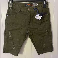 Dark Green Shorts, With A Few Rips. Green Casual Bottoms With Zip Fly, Casual Green Bottoms With Zip Fly, Green Bottoms With Zip Fly For Spring, Summer Cotton Bottoms With Zip Fly, Casual Spring Shorts With Zip Fly, Casual Shorts With Zip Fly For Spring, Casual Zip Fly Shorts For Spring, Green Cotton Bottoms With Zip Fly, Green Jean Shorts