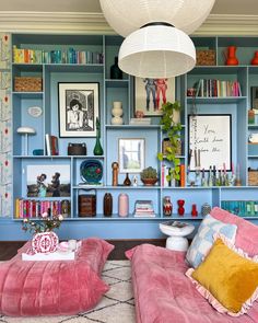 a living room filled with lots of colorful furniture