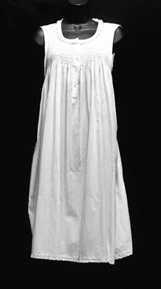 Beautiful cotton gown, long with smocked bodice. Classic Dresses With Smocked Back For Daywear, Classic Daywear Dresses With Smocked Back, Empire Waist Maxi Dress With Fitted Bodice For Daywear, Cotton Dress With Ruched Bodice For Daywear, Classic Daywear Dress With Smocked Bodice, Classic Empire Waist Dress For Daywear, Maxi Dress With Ruched Bodice For Daywear, Classic Cotton Prairie Dress For Daywear, Daywear Maxi Dress With Ruched Bodice