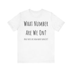 Indulge in the ultimate comfort and style with our "What Number are we On?" unisex jersey short sleeve tee. The small print says "And how many dancers are there?" Made with soft cotton and featuring a quality print, you'll fall in love with this shirt over and over again. With ribbed knit collars, tapered shoulders, and dual side seams, it's perfect for active or leisure wear. Plus, its retail fit and classic crew neckline make it versatile for any occasion. Made with 100% Airlume combed and rin Crew Neck T-shirt With Text Print For Dance Class, Text Print Crew Neck T-shirt For Dance Class, Crew Neck Text Print T-shirt For Dance Class, Casual T-shirt With Text Print For Dance Class, Casual Text Print T-shirt For Dance Class, Graphic Print T-shirt For Dance Class In Summer, White Fitted T-shirt For Dance Class, Dance Major, Wear Store