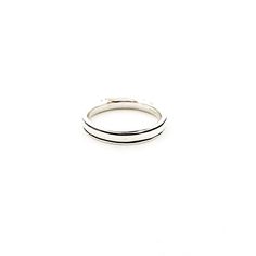 Wear this 4.5mm Jordan Linear Groove Band Ring for a confident, modern style. Crafted from sterling silver, the ring features clean linear grooves with a sleek black patina finish. This versatile band is perfect for anyone! As always, our MTT Jewelry has a lifetime guarantee. If the jewelry were to ever break or tarnish for any reason, we will fix or replace it for free. Thermal Sweater, Flat Heel Boots, Cut Clothes, Beanie Style, Sneaker Slippers, Backpacking Packing, Accessories Rings, Active Wear Leggings, Swim Accessories