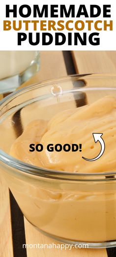 a glass bowl filled with pudding on top of a wooden table