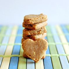 three cookies stacked on top of each other with a heart shaped cookie in the middle