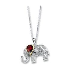 An adorable elephant is decorated with a garnet, diamonds and 14K yellow gold accents in this timeless necklace for her. Fashioned in sterling silver, the necklace fastens with a lobster clasp. Timeless Necklace, Jared The Galleria Of Jewelry, Necklace For Her, Elephant Necklace, Garnet Stone, Necklace Designs, Cable Chain, Gold Accents, Jewelry Art