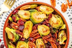 brussel sprouts with pecans and cranberries in a bowl