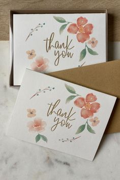 two thank you cards with watercolor flowers on them