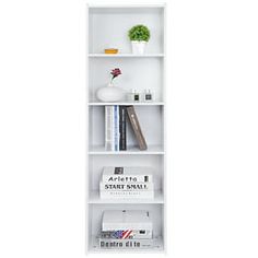 a white book shelf with books and other items on top of it, against a white background