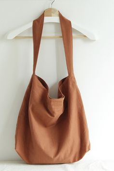 #totebag #orange #cotton #Minimalist Rectangular Solid Color Hobo Bag For Everyday, Versatile Solid Color Shoulder Bag For Everyday, Everyday Brown Solid Hobo Bag, Everyday Brown Canvas Bag With Cell Phone Pocket, Everyday Solid Color Canvas Bag, Everyday Hobo Tote Bag With Mobile Phone Bag, Simple Everyday Shoulder Bag With Pockets, Everyday Brown Solid Color Hobo Bag, Simple Solid Color Tote Shoulder Bag