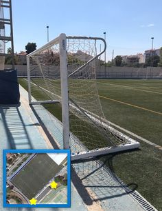 an aerial view of a soccer field with the goal post