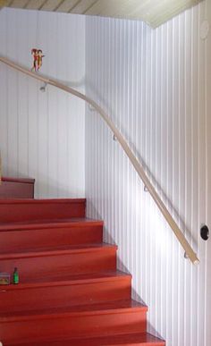 red stairs leading up to the second floor