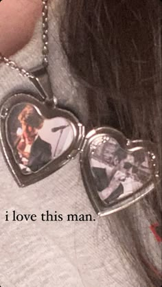 a woman wearing a necklace with two heart shaped pictures attached to it's sides