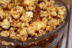 a glass bowl filled with caramel popcorn