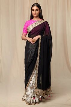 Ivory oasis printed saree, with sheer black palla, embellished with embroidered border and tassel detail. Comes with hot pink wallflower print blouse piece.
Components: 2
Pattern: Print
Type Of Work: Oasis, Wallflower
Fabric: Raw Silk, Organza
Color: Ivory
Other Details: 
Embroidered borders
Tassel edged palla
Unstitched blouse piece: 1 metre Raw Silk
Note: The stitched blouse worn by the model is not for sale
Disclaimer: The actual print-placement of the product may vary slightly from the image Black Organza Saree, Caribbean Fashion, House Of Blouse, Raw Silk Fabric, Print Saree, Embroidered Border, Black Saree, Lakme Fashion Week, Organza Saree