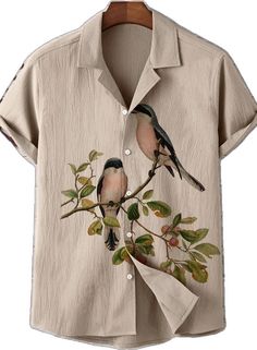 a shirt with two birds painted on it