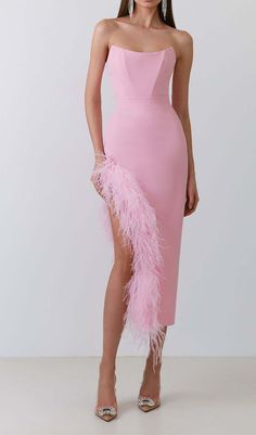 Make a seriously stylish statement in this bodycon midi dress accented with playful ostrich feather trim along the front slit. The bright bubblegum hue complements sun-kissed skin while the curve-hugging fit highlights your assets. Wear it with neutral heels and accessorize minimally. Gentle Dry Clean Only Colour may vary due to lighting on images. The product images (without model) are closest to the true colour of the product.Item runs true to size chart and is cut to suit our size chart. Plea Feather Party Dress, Feather Party, Midi Bandage Dress, Pink Tube Top, Ostrich Feather Trim, Kate Dress, Feather Skirt, Bandage Midi Dress, Feather Trim