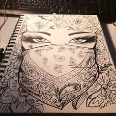 a drawing of a woman's face wearing a bandana with flowers on it