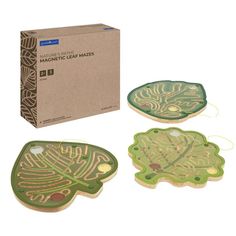 three wooden coasters in front of a cardboard box