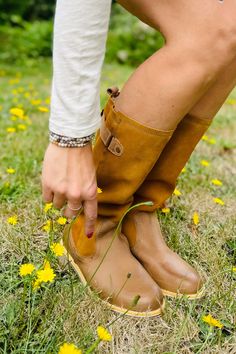 Our warm, water-resistant Marcella boot combines riding-boot elegance with a tread built for walking. Details like contrast stitching and a decorative strap around calf make this leather-and-suede boot the perfect complement to your coziest winter looks. Made in Portugal Water resistant Inside zipper closure Warm wool lining Rubber outsole Heel height 1 1/2 inches Shaft height 13 inches Tan Tall Boots, Tall Tan Boots, Tall Boot, Riding Boot, Shoe Boutique, Shoe Fits, Winter Looks, Tall Boots, Contrast Stitch