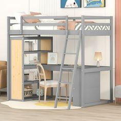 there is a loft bed with a desk underneath it