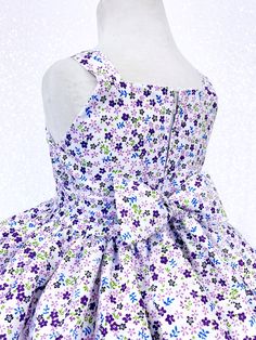 Perfect for photoshoots, pageants, birthdays, or to celebrate any holiday! Knee length dress made out of a floral patterned cotton. Bodice is sleeveless with a zipper on the back. On each side of the waist, there's attached ribbon that can be tied in the back into a bow. Underneath skirt is a layer of lining with crinoline attached to give the bottom shape. The dress is meant to be knee length. *Mannequin has petticoat to show detail. !PETTICOAT NOT INCLUDED! LINK TO PURCHASE PETTICOAT: https:// Knee Length White Dress, Pageant Photoshoot, Birthday Party Photoshoot, Toddler Pageant, White Knee Length Dress, Party Photoshoot, Photoshoot Props, Graduation Photoshoot, White Gowns