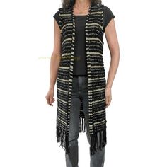 FRINGE BENEFITS! We are loving this beautiful boho open front, nubby knit duster sweater vest from Chico's. Features black knit with gold metallic stripes and a fun fringed hemline. This will add a touch of sass to any outfit. Excellent pre-owned condition. Winter Bohemian Black Vest, Bohemian Knit Sweater Vest For Fall, Bohemian Vest For Fall Layering, Fall Sleeveless Vest With Tassels, Casual Fringed Vest For Fall, Sweater Vest Black, Knit Duster, Duster Sweater, Long Duster