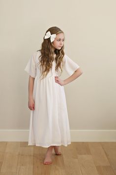 Eliza White French Gauze Full Length Dress – Woodmouse And Thistle White Cotton Gauze Spring Dress, White Cotton Gauze Dress For Spring, White Modest Short Sleeve Maxi Dress, White Modest Maxi Dress With Short Sleeves, Spring First Communion Dresses With Flutter Sleeves, First Communion Spring Dresses With Flutter Sleeve, White Flutter Sleeve Maxi Dress For Daywear, Summer Wedding First Communion Dress With Short Sleeves, White Short Sleeve First Communion Dress For Spring