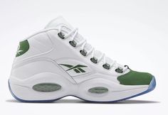 Up for sale is a pair of Reebok Question Mid Junior Basketball shoes in size 6. These sneakers feature lace-up closure, colorblock pattern, and mid-top shoe shaft style. The outsole is made of rubber for better traction, while the upper material is synthetic, and the lining material is synthetic as well. These athletic shoes are perfect for activewear during the summer and spring seasons. The shoe is cushioned for comfort and breathable for better ventilation. The shoes are brand new and have never been worn before. Don't miss your chance to own a pair of these stylish and high-performing Reebok Question Mid sneakers. Reebok Question Mid, Reebok Question, Allen Iverson, Mens Lifestyle, White Pine, Pine Green