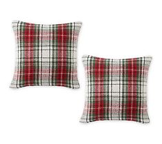 two red and green plaid pillows