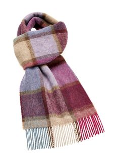 A bold, patchwork-effect Block Check featuring both masculine and feminine tones. The stunning modern Pateley scarf is loved by all. Made from 100% Pure Merino Lambswool the finest available species of Lambswool giving a soft and luxurious feel to the product. Seen here is the Pateley Pink Check Scarf Approximate size including fringe 10" x 75" (w x l) MADE IN ENGLAND All of our items are designs of Bronte by Moon and are woven by experts with authentic English craftmanship who have been producing quality wool products at their mill in Yorkshire, England since 1837. One of the last remaining vertical mills in England it has been operating since the end of the Industrial Revolution and they are World Leaders in dyeing, spinning, weaving, blending and finishing, producing beautiful products Wool Products, Plain Scarves, Plaid Throw Blanket, Check Scarf, Masculine And Feminine, Tartan Blanket, Led Dog Collar, Merino Wool Scarf, Tartan Scarf