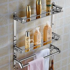 a bathroom shelf that has some bottles on it